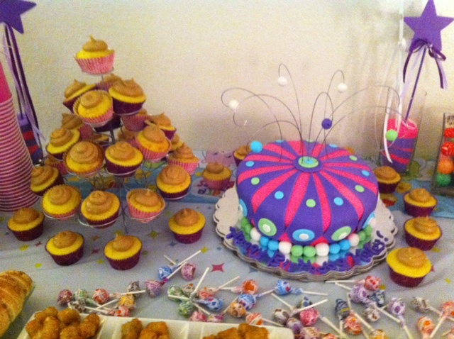 Beautiful topsy-turvy red velvet cake and pb+j cupcakes