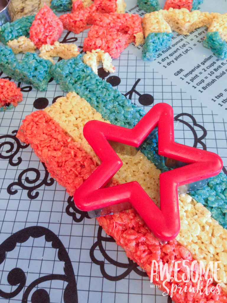 Red, White + Blue Star Crispies are easy and fun to make! Perfect for your next patriotic picnic! | Awesome with Sprinkles