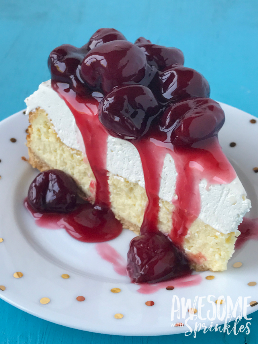 Vanilla bean cheesecake with homemade rum cherry sauce made with fresh whole cherries is the classic dessert! | Awesome with Sprinkles