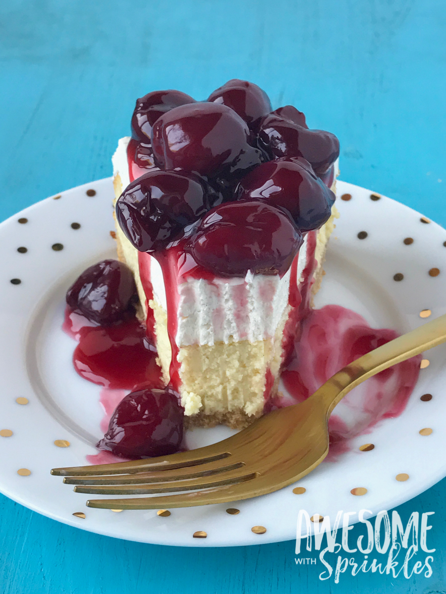 Vanilla bean cheesecake with homemade rum cherry sauce made with fresh whole cherries is the classic dessert! | Awesome with Sprinkles