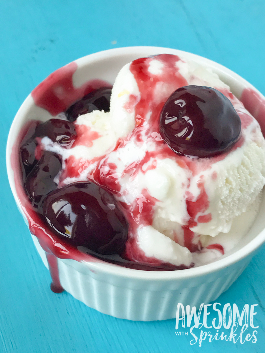 This delightful Rum Cherry Sauce made with fresh whole cherries is perfect for topping cheesecake, ice cream, pancakes and more! | Awesome with Sprinkles