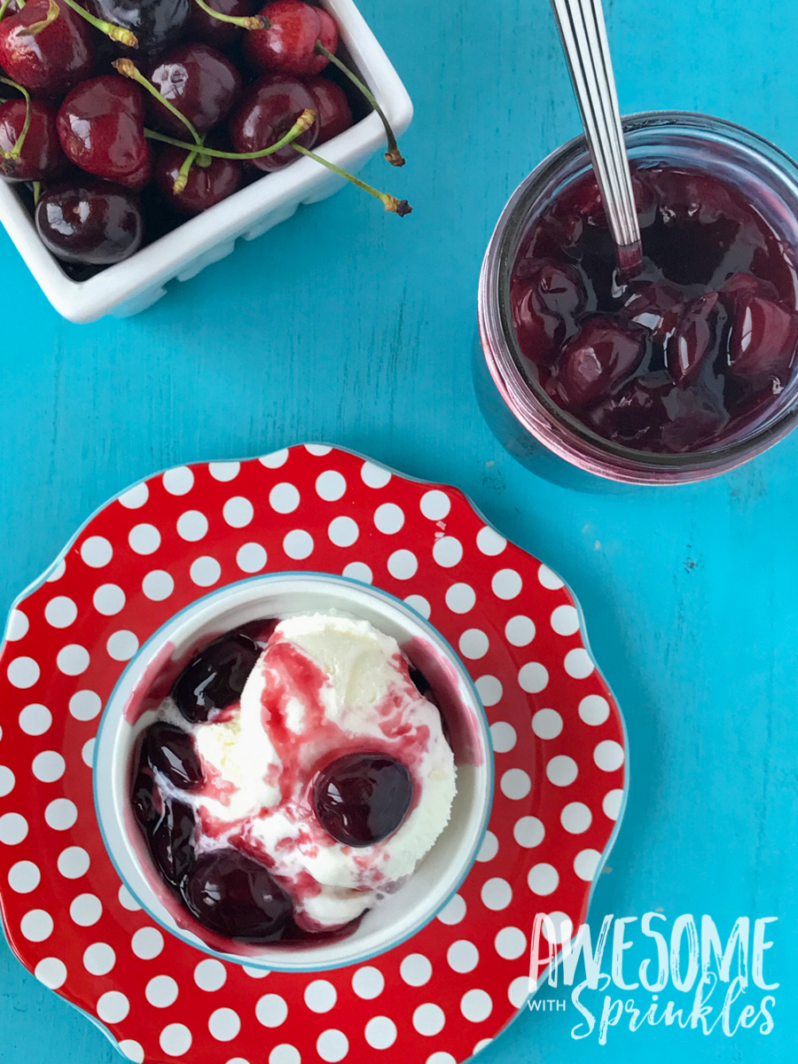 This delightful Rum Cherry Sauce made with fresh whole cherries is perfect for topping cheesecake, ice cream, pancakes and more! | Awesome with Sprinkles