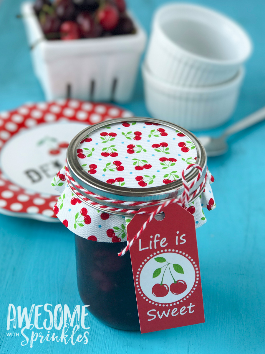 This delightful Rum Cherry Sauce made with fresh whole cherries is perfect for topping cheesecake, ice cream, pancakes and more! | Awesome with Sprinkles