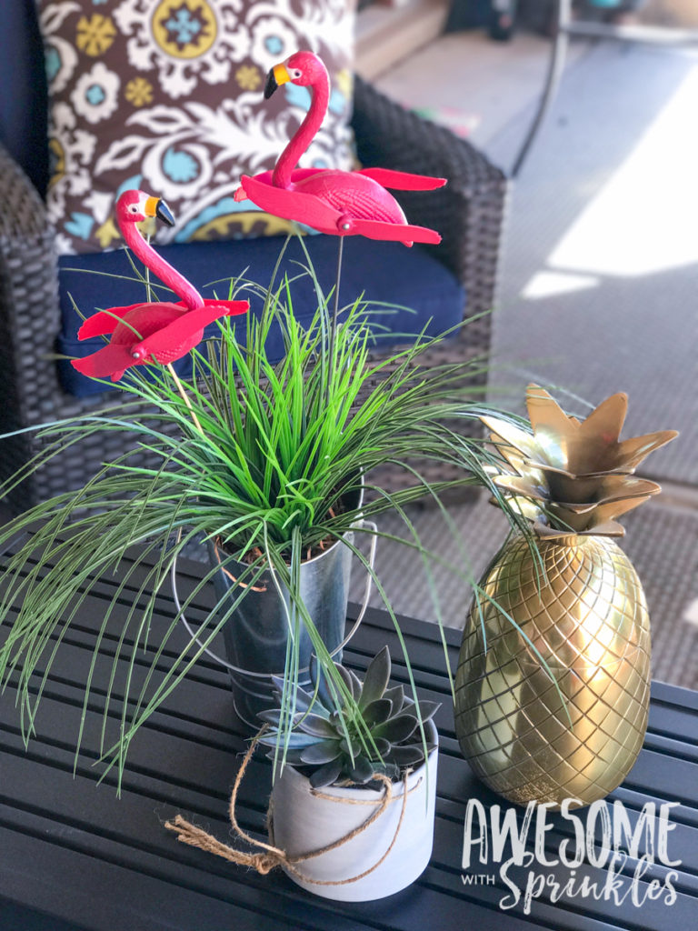 Use flamingos to create a cute "lawn party" themed centerpiece