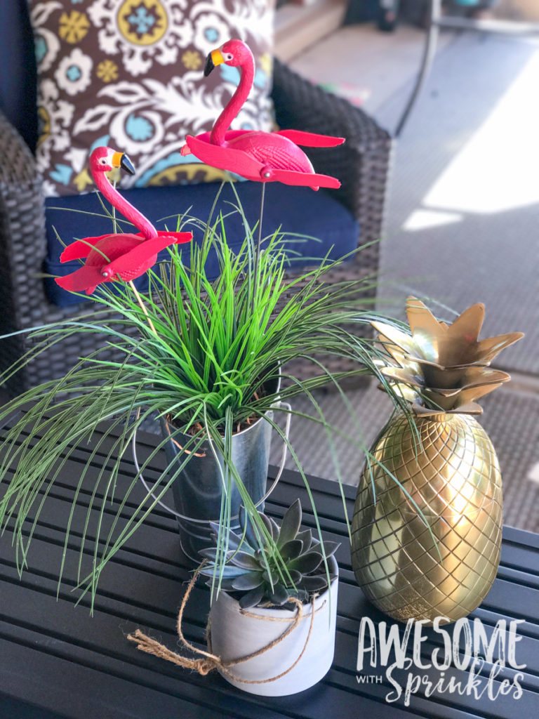 Use flamingos to create a cute "lawn party" themed centerpiece