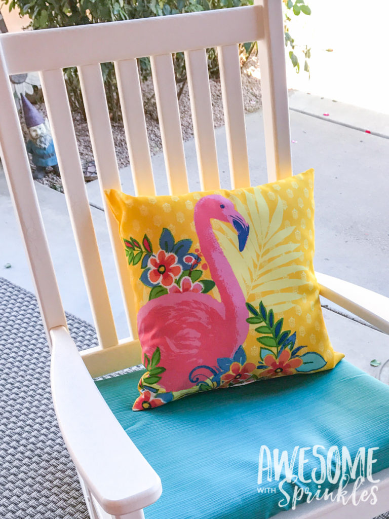 A cute flamingo patio toss pillow